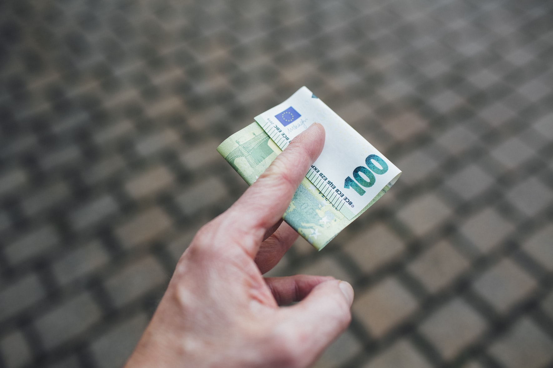 Can an international student earn extra money while studying in Spain?
